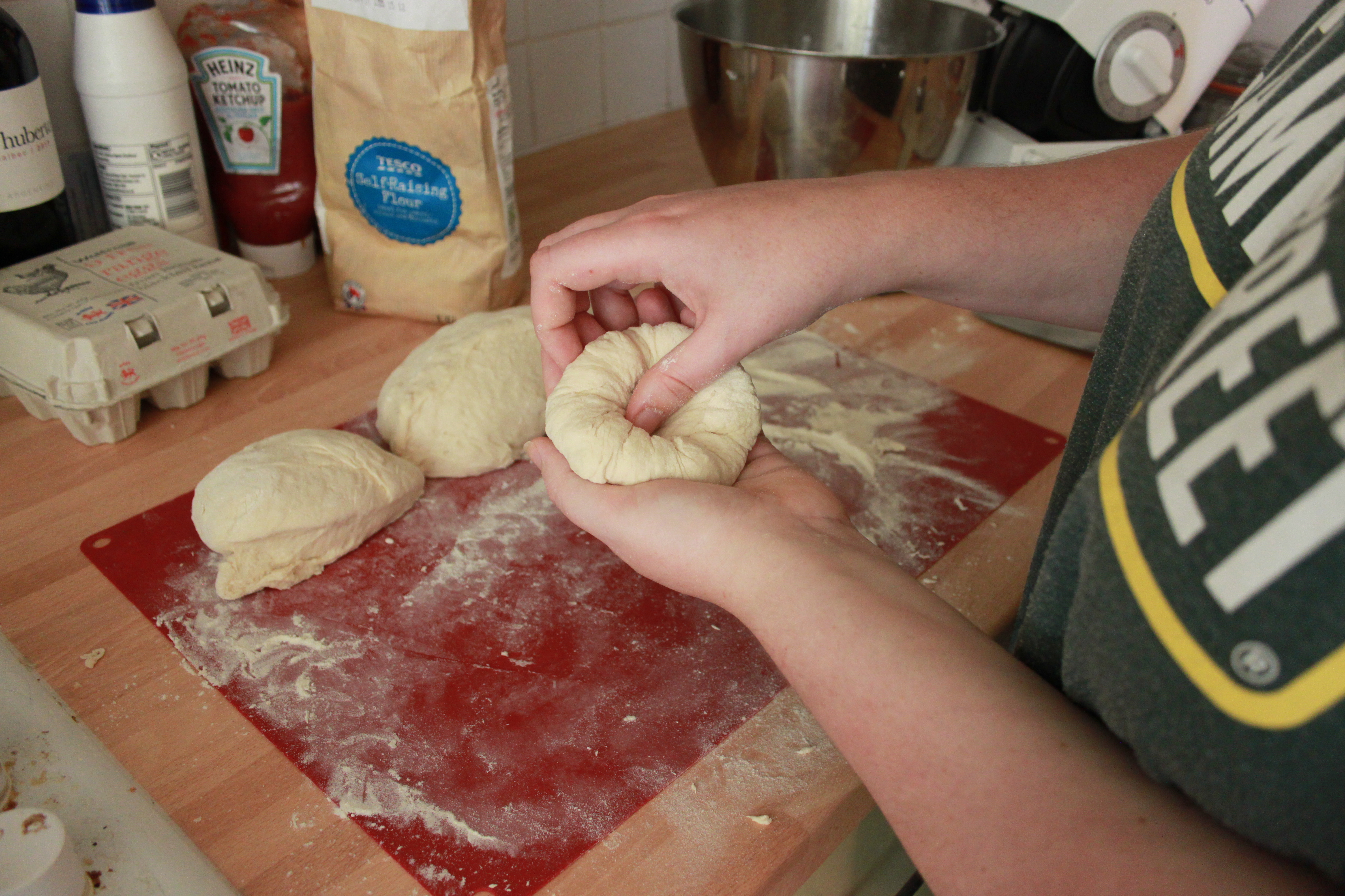 thumb about to go into dough ball