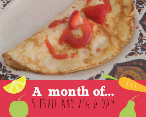 strawberry pancakes with "a month of 5 a day" surrounded by cartoon fruit and veg