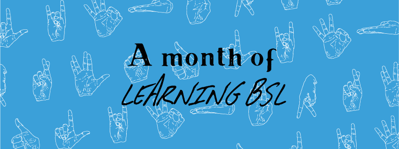 A month of learning BSL on blue background with hand gestures in the background