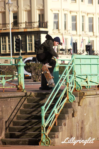 Skater trying big leap down stairs 